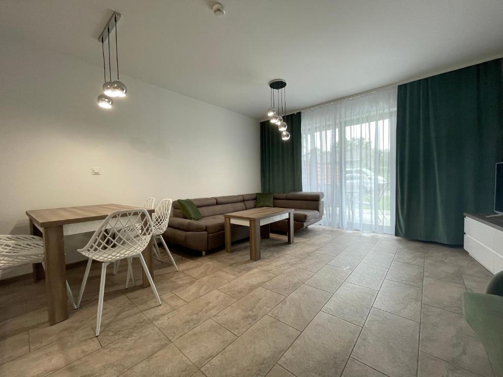 Posedenie v ubytovaní Apartament Biała Róża