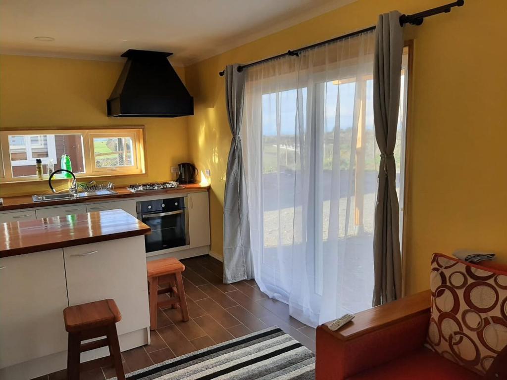 A cozinha ou kitchenette de Cabañas Quimantu-Aguas Calientes