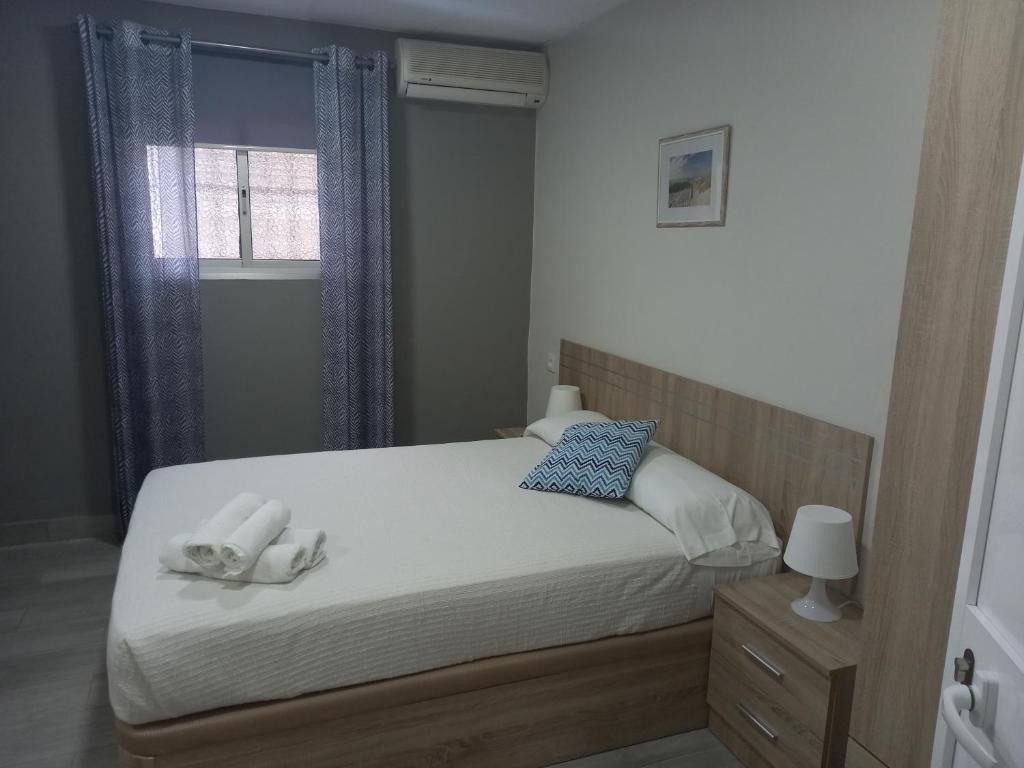 Postel nebo postele na pokoji v ubytování Casa Inocencio