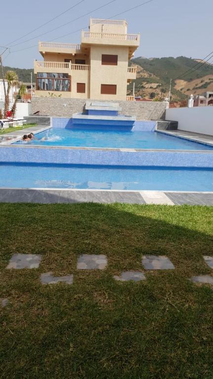 Bazén v ubytování Apparemment de luxury nebo v jeho okolí