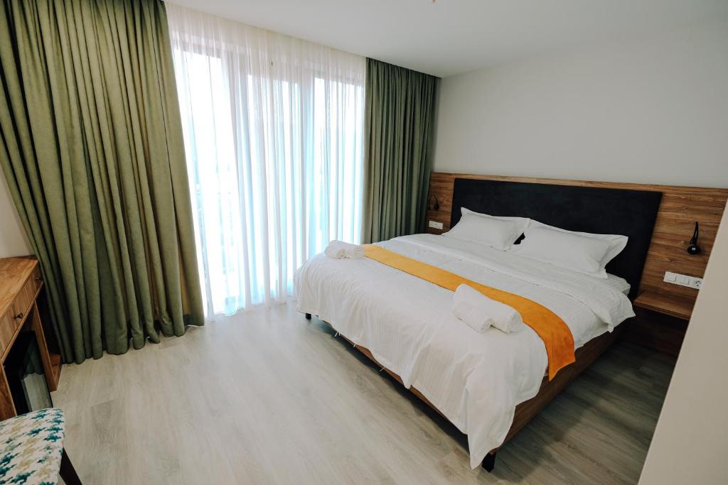 Postel nebo postele na pokoji v ubytování Hotel Doesi