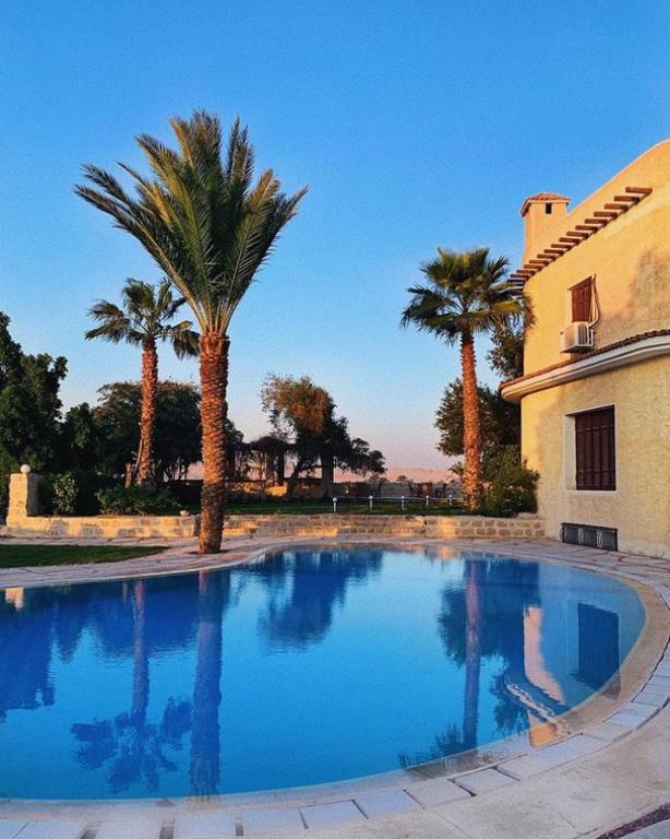 Bazén v ubytování Tache Boutique Hotel Fayoum nebo v jeho okolí