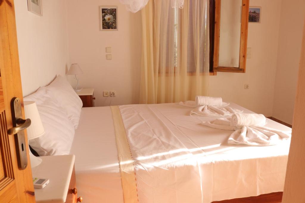 Postel nebo postele na pokoji v ubytování Villa Milia