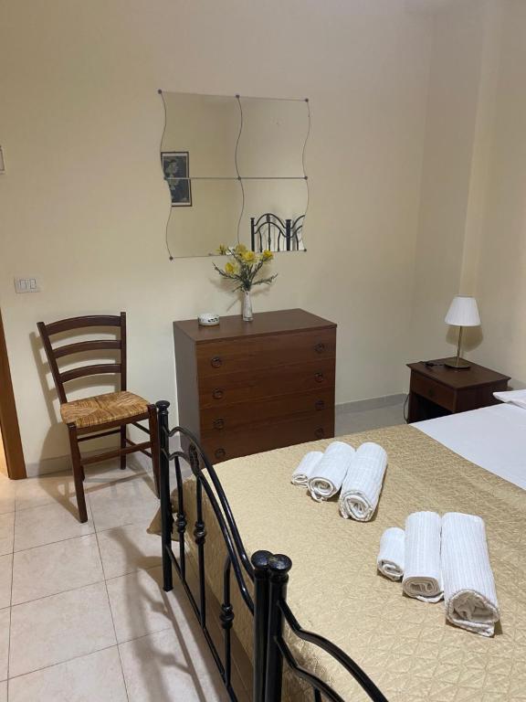 Postel nebo postele na pokoji v ubytování Casa vacanze, a due passi da Taormina (ME)