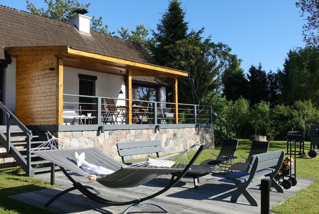 Vonkajšia záhrada v ubytovaní Sielskie Sioło - domki nad jeziorem