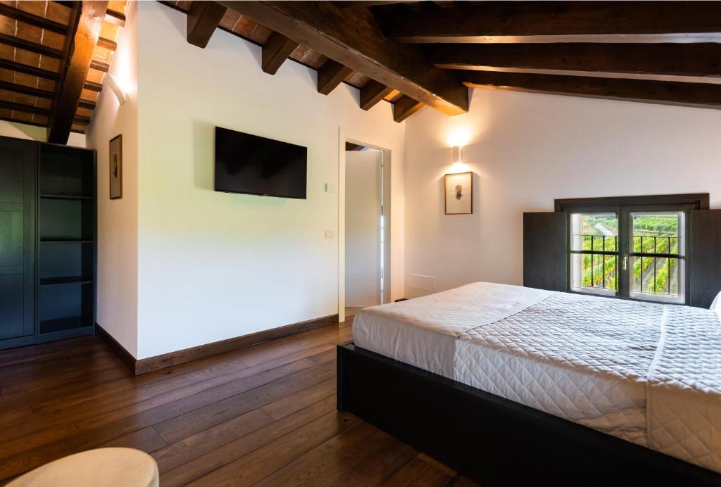Posteľ alebo postele v izbe v ubytovaní Al Pompiere - Wine and rooms