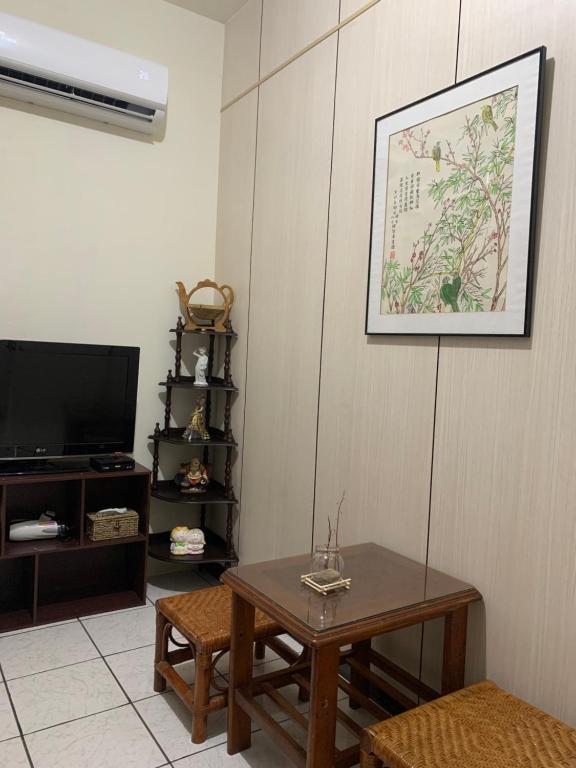 TV a/nebo společenská místnost v ubytování Guan Ma Homestay