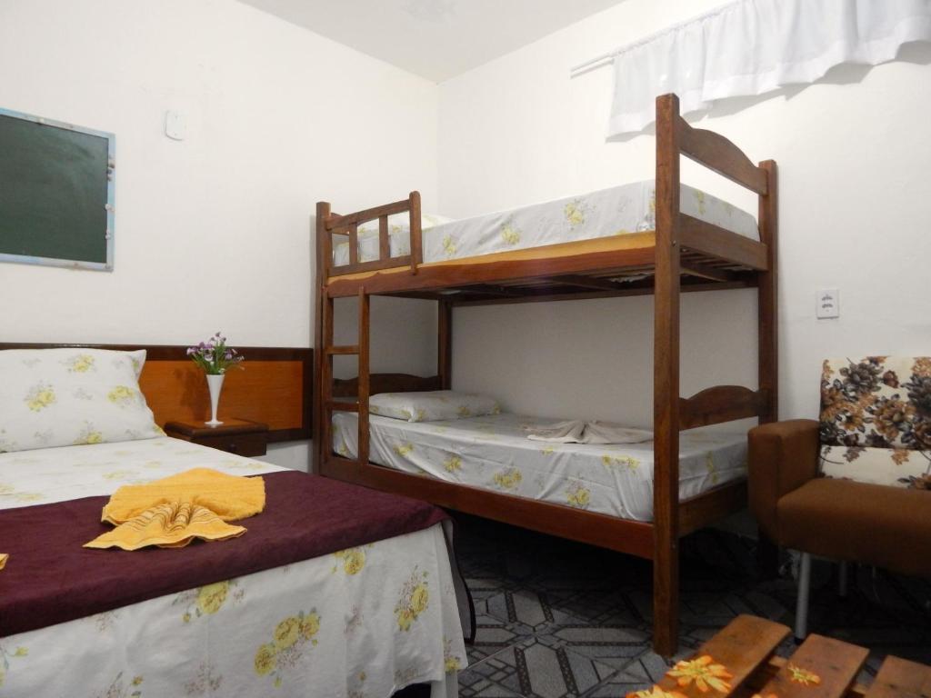 Postel nebo postele na pokoji v ubytování Praia Hostel