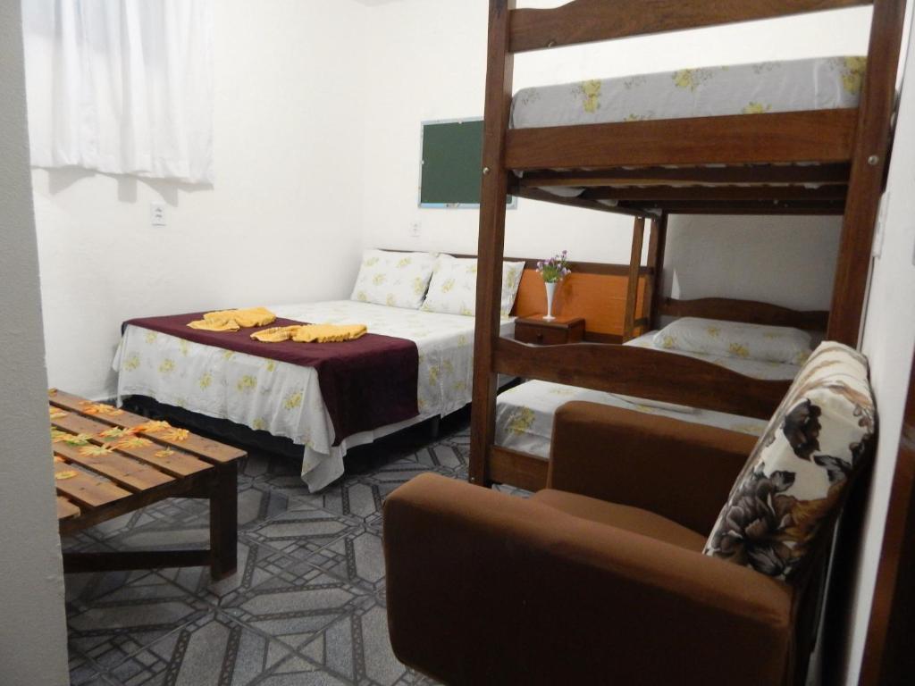 Postel nebo postele na pokoji v ubytování Praia Hostel
