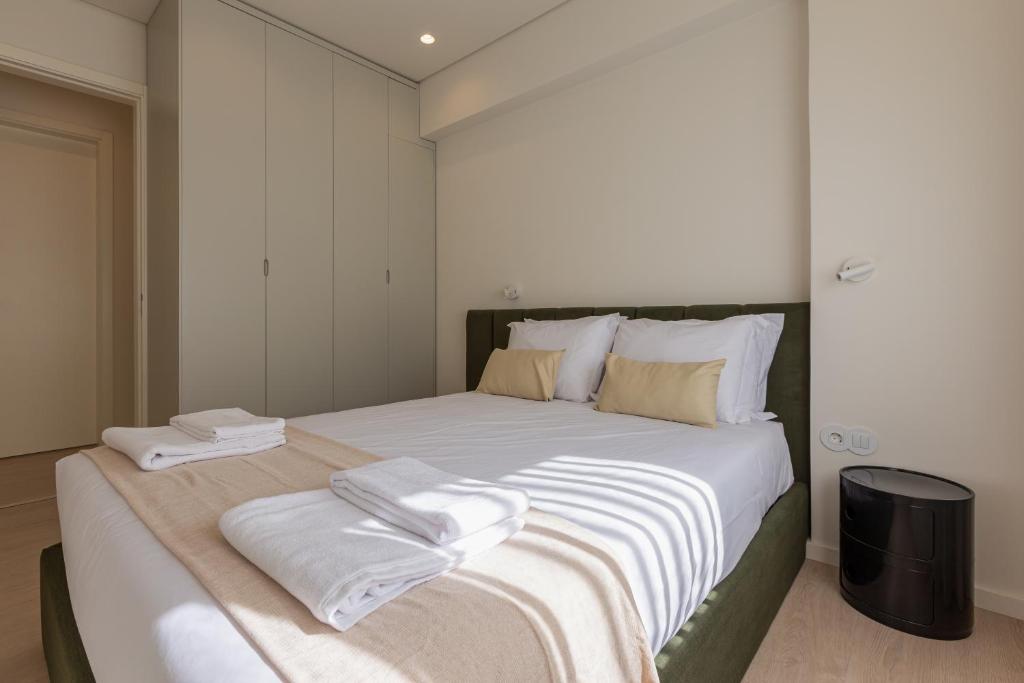 Ένα ή περισσότερα κρεβάτια σε δωμάτιο στο ORM Antero Apartment