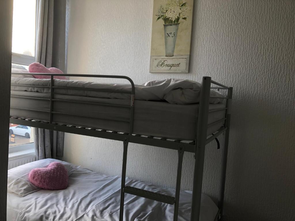 Postel nebo postele na pokoji v ubytování Melrose Hotel