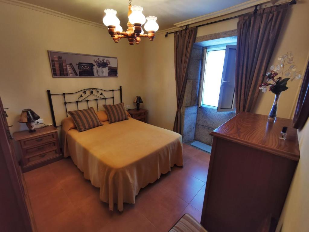 Posteľ alebo postele v izbe v ubytovaní Casa Duarte