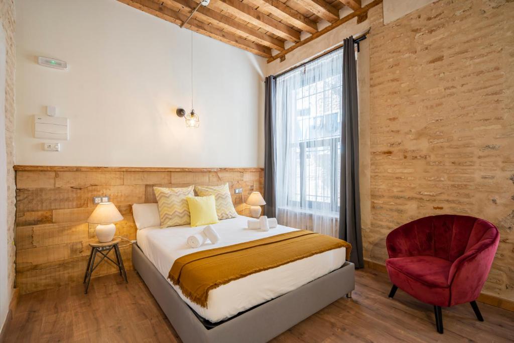 Postel nebo postele na pokoji v ubytování Dobo Azacanes Hostal