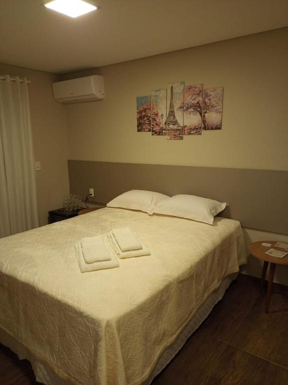 Postel nebo postele na pokoji v ubytování CasAlta Pousada