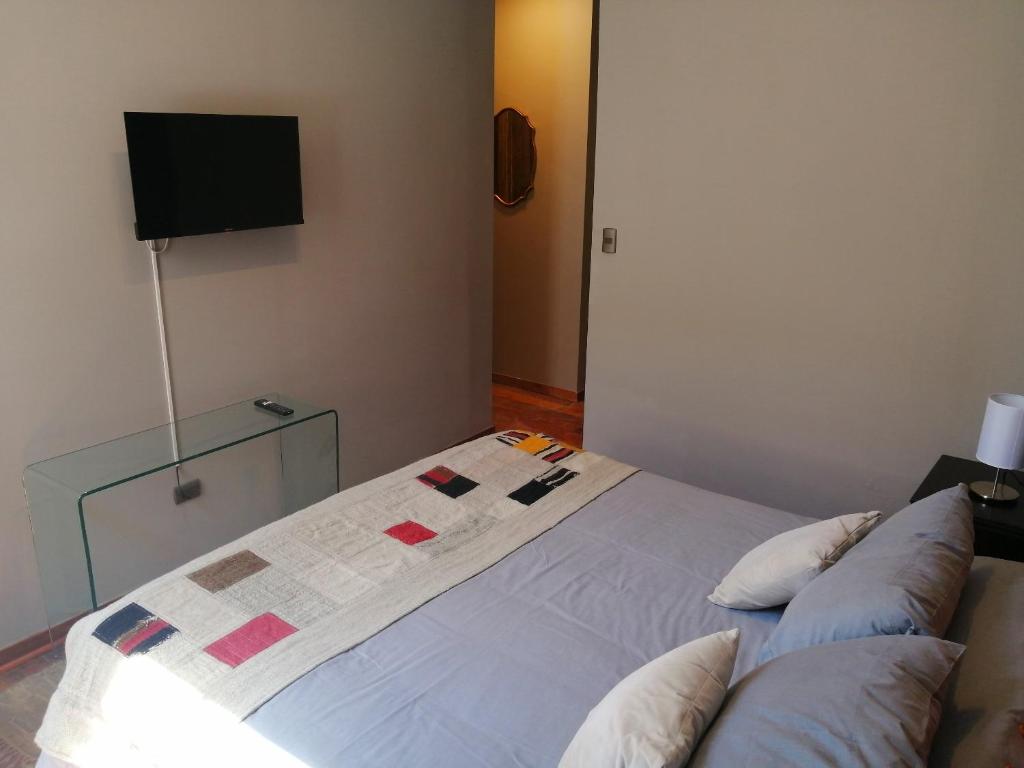 Postel nebo postele na pokoji v ubytování BO Hotel & Terraza