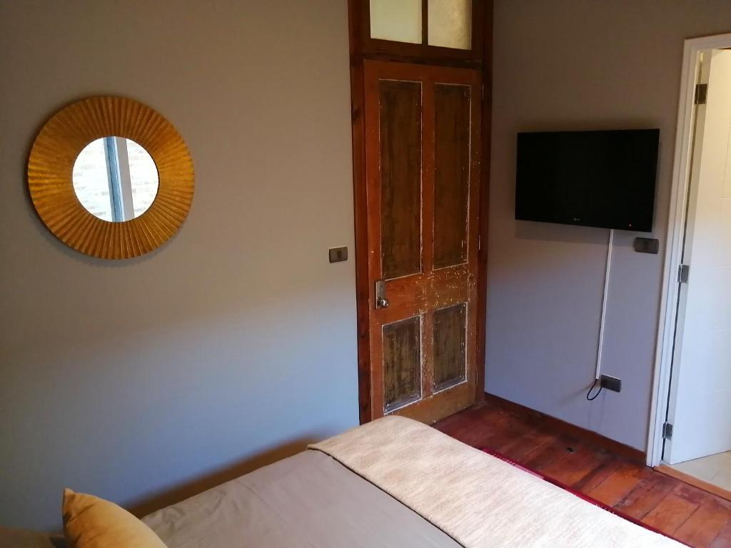 Postel nebo postele na pokoji v ubytování BO Hotel & Terraza