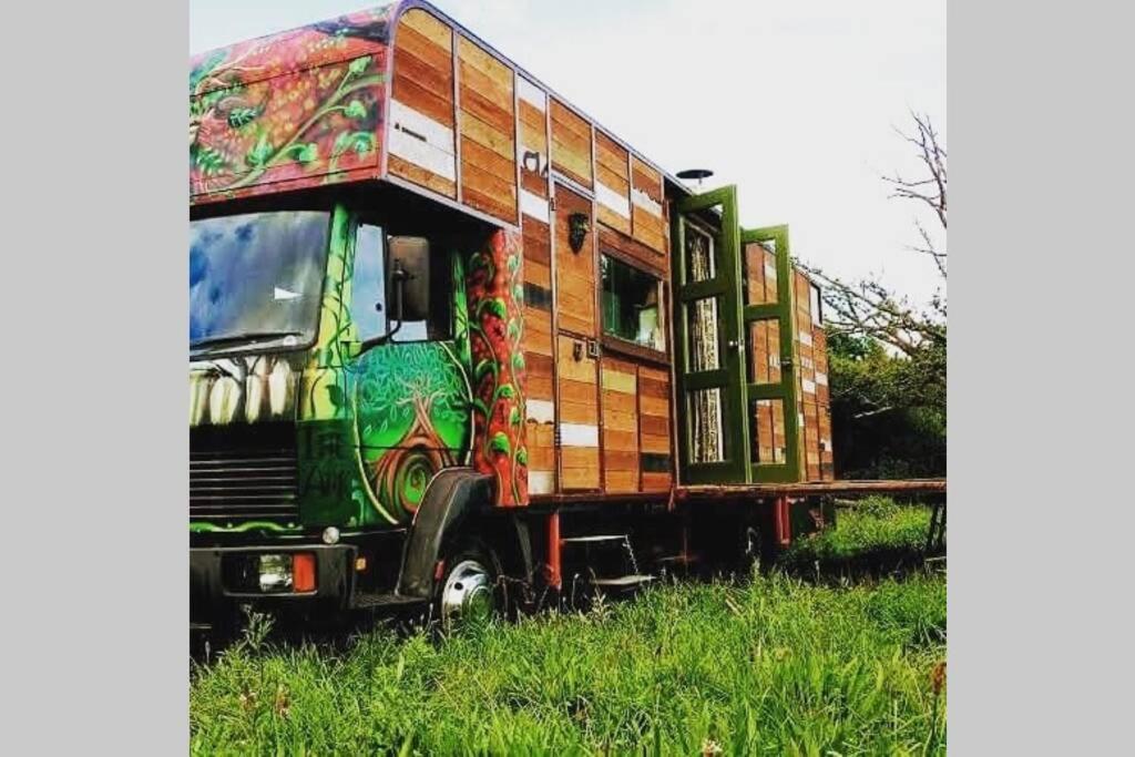 a truck with a house on the back of it at Glamp in Style in an Unique Horsebox Home in Battle