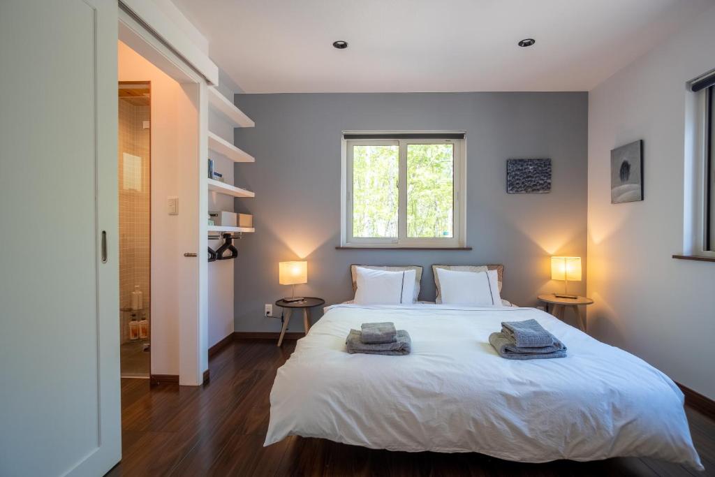 Postel nebo postele na pokoji v ubytování Forest Hideaway