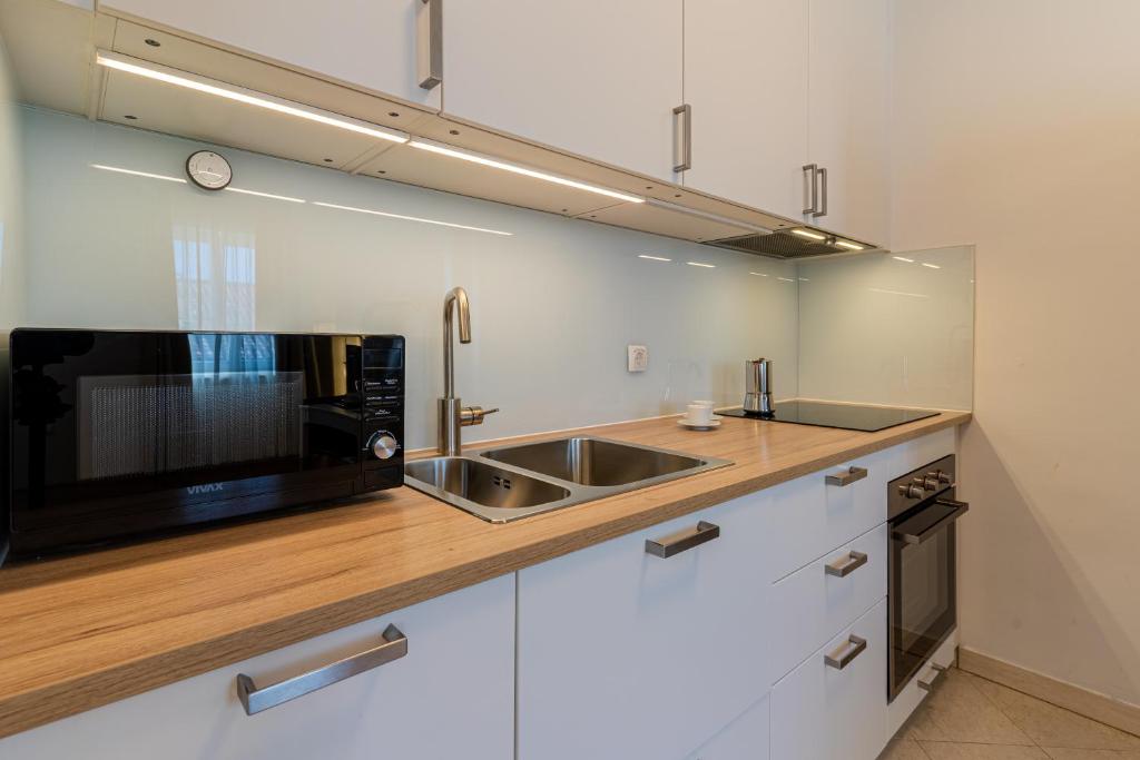 Kuchyň nebo kuchyňský kout v ubytování House Catania
