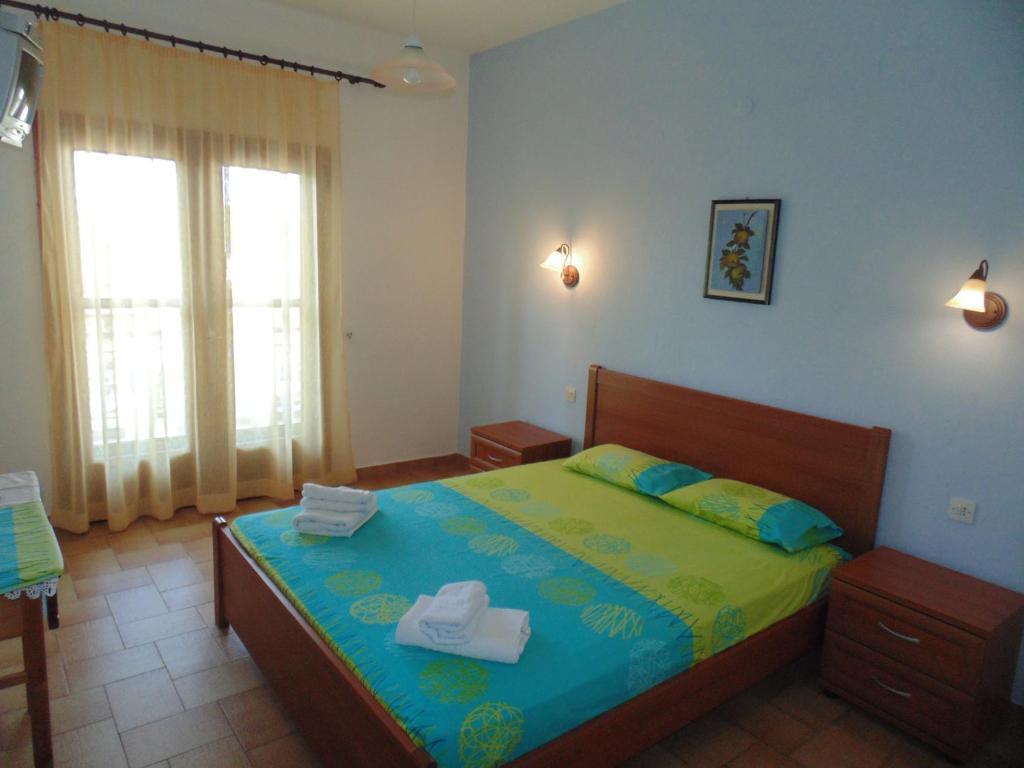 Postel nebo postele na pokoji v ubytování House Evristhenis 1