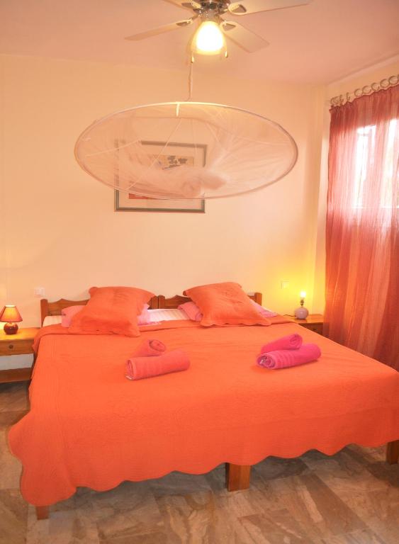 Postel nebo postele na pokoji v ubytování Lemoni Apartments