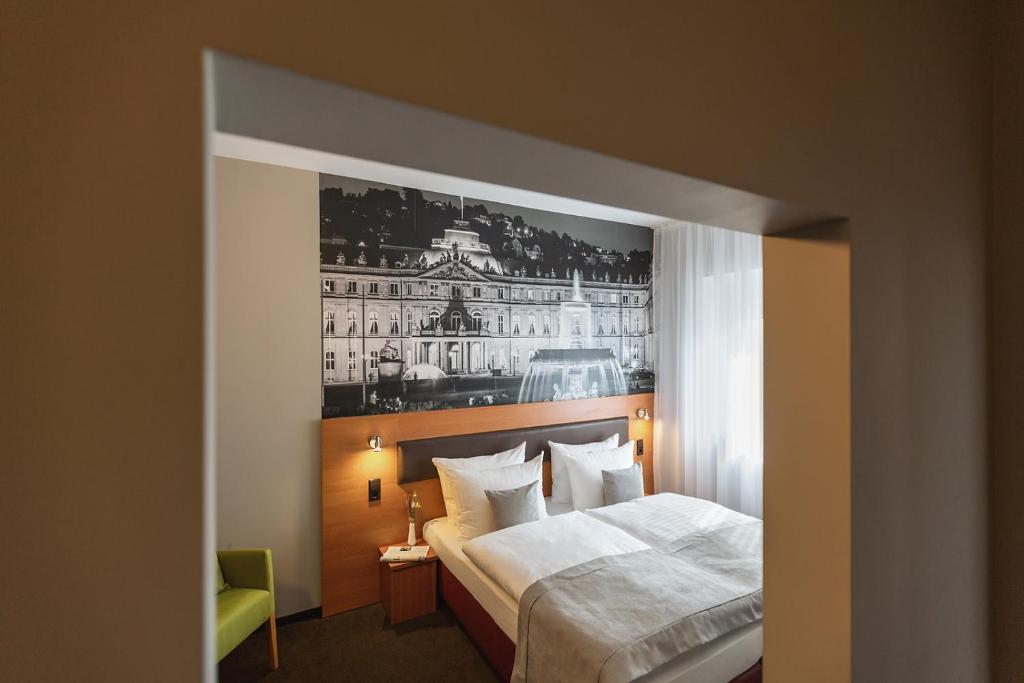 Postel nebo postele na pokoji v ubytování Novum Hotel Bruy