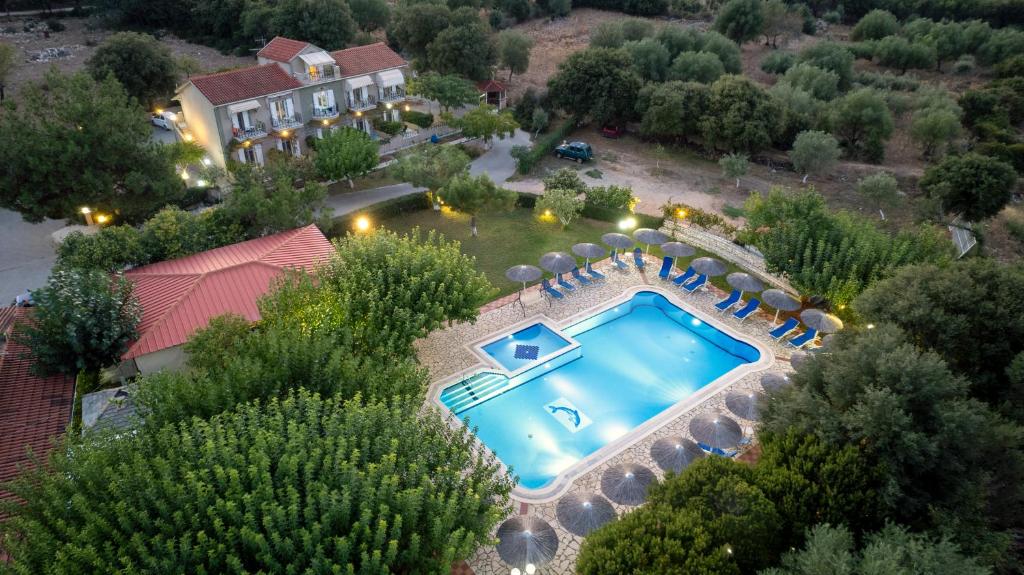 an aerial view of a house with a swimming pool at Stalaktites Studios in Sami