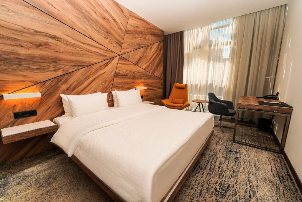 Postel nebo postele na pokoji v ubytování Messier 53 Hotel Yerevan