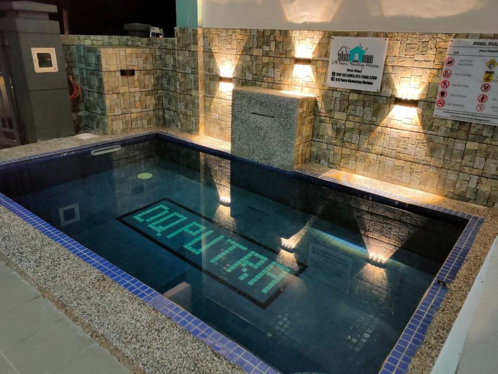 Πισίνα στο ή κοντά στο D'Q Putra Homestay Melaka Unit MIQA