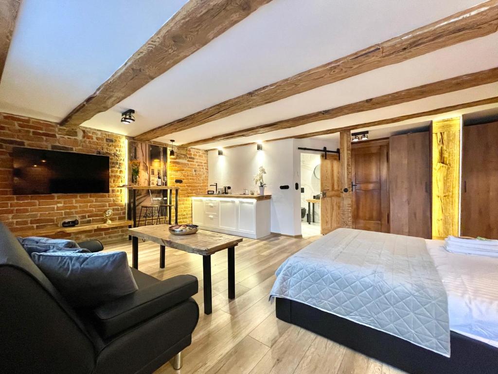 Televízia a/alebo spoločenská miestnosť v ubytovaní Maria 3 Apartment
