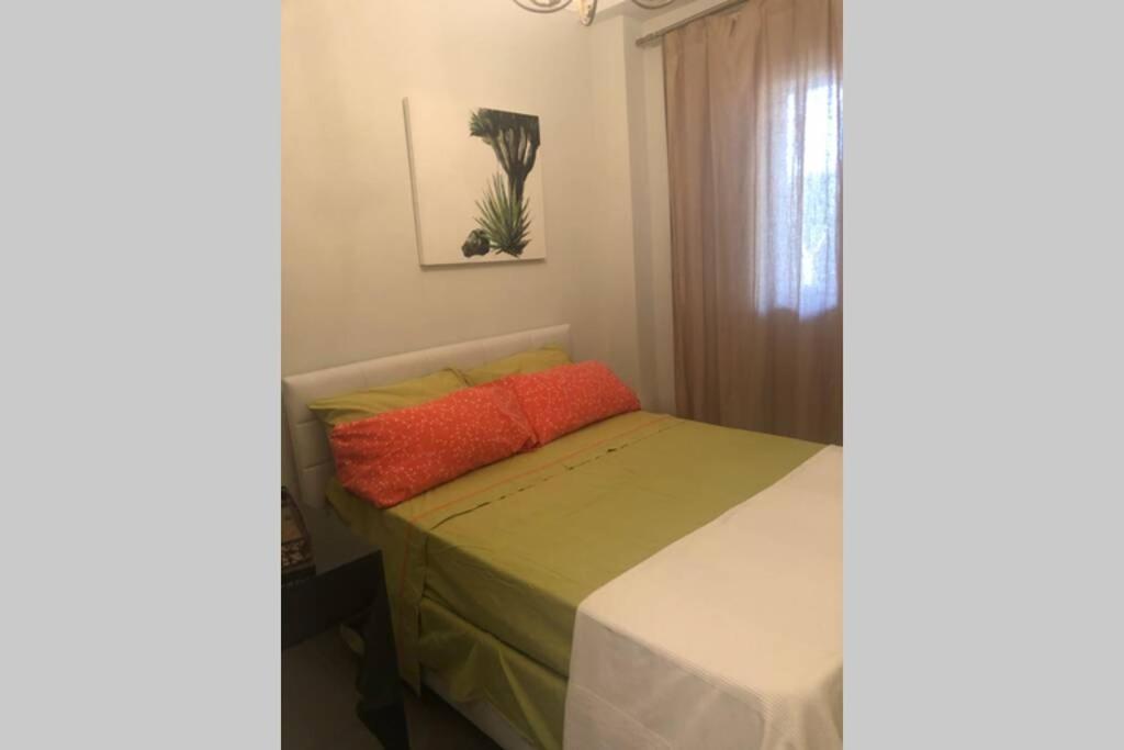 Postel nebo postele na pokoji v ubytování Villa Luis