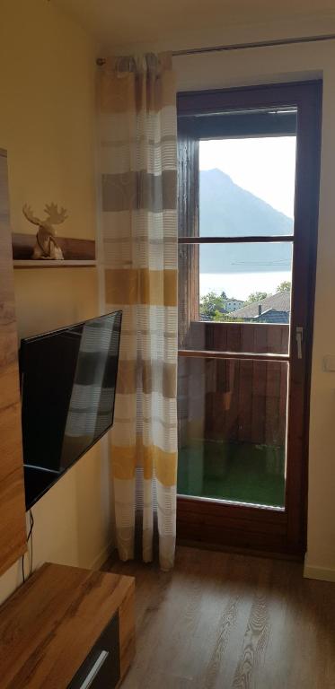 Postel nebo postele na pokoji v ubytování Auszeit am Traunsee