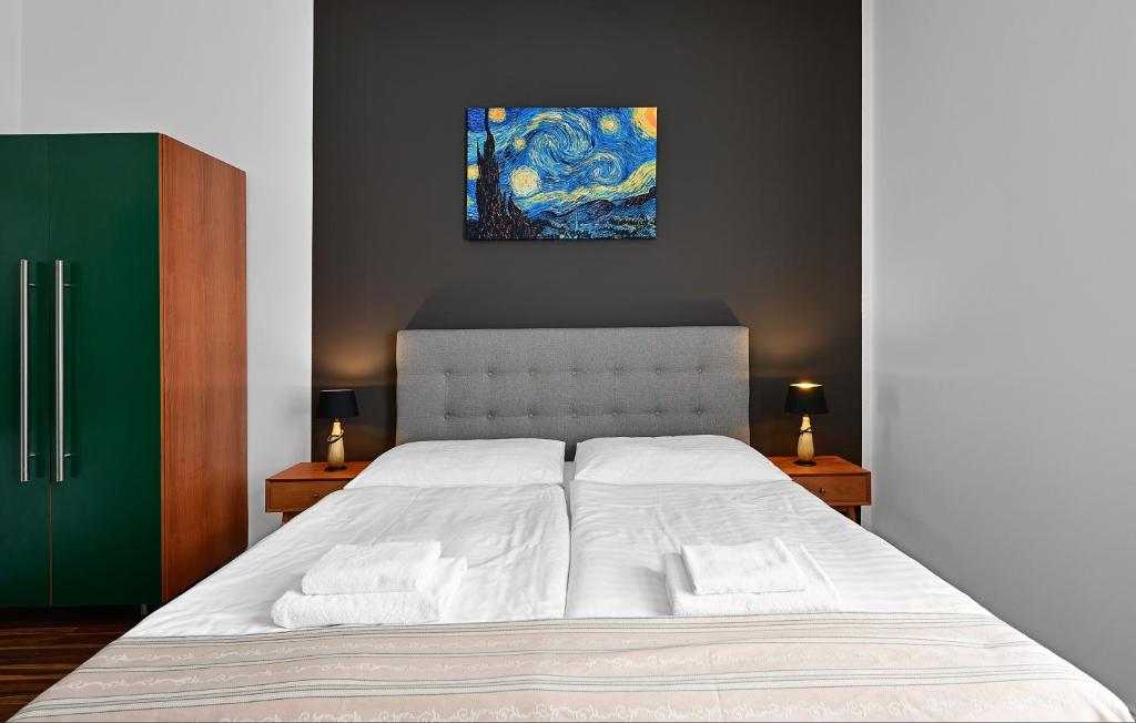 Postel nebo postele na pokoji v ubytování Hotel Malá Strana