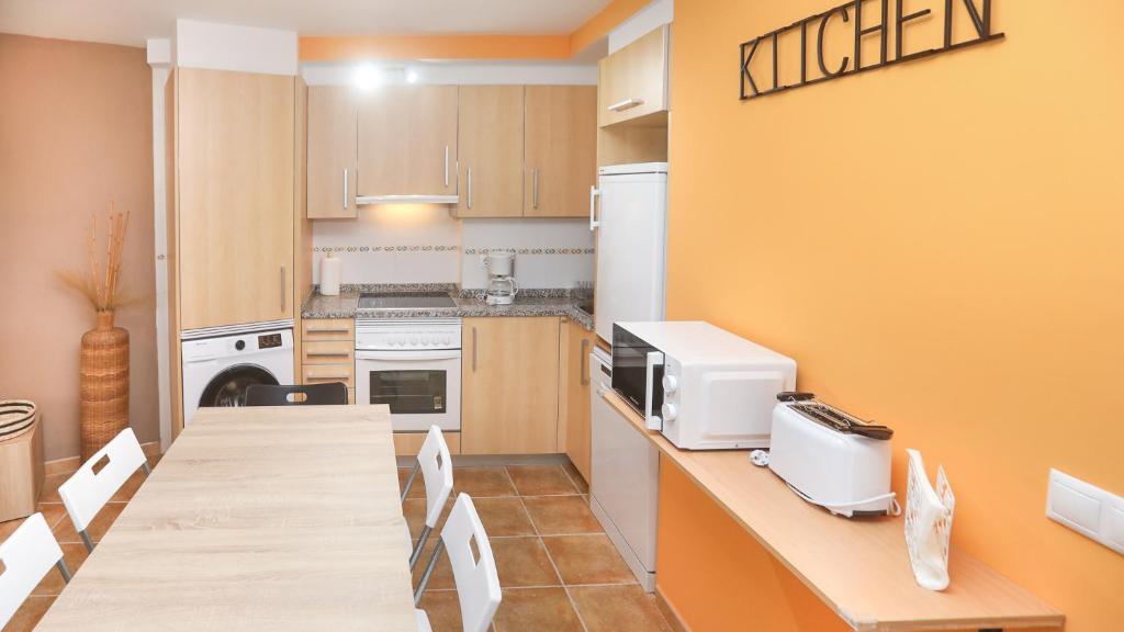 Kuchyň nebo kuchyňský kout v ubytování Hospedium Galitrips Airexa
