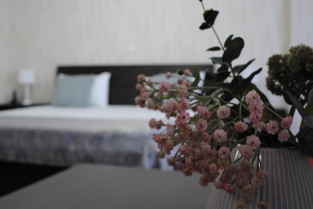 Postel nebo postele na pokoji v ubytování Hotel Corona