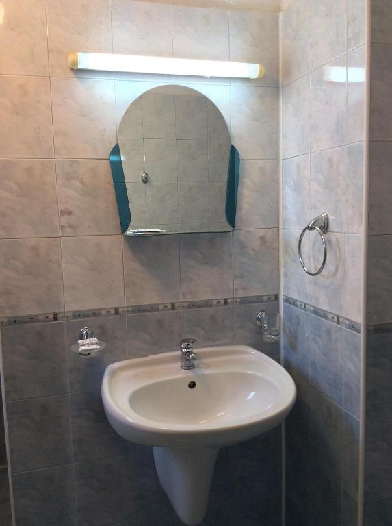 Koupelna v ubytování Michel Hotel