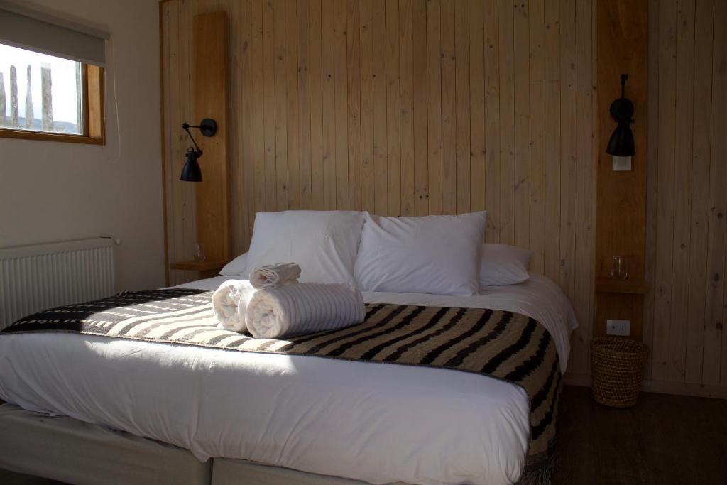Postel nebo postele na pokoji v ubytování AKA Patagonia