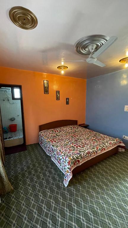 Postel nebo postele na pokoji v ubytování Dilaram Guest House