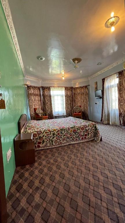 Postel nebo postele na pokoji v ubytování Dilaram Guest House