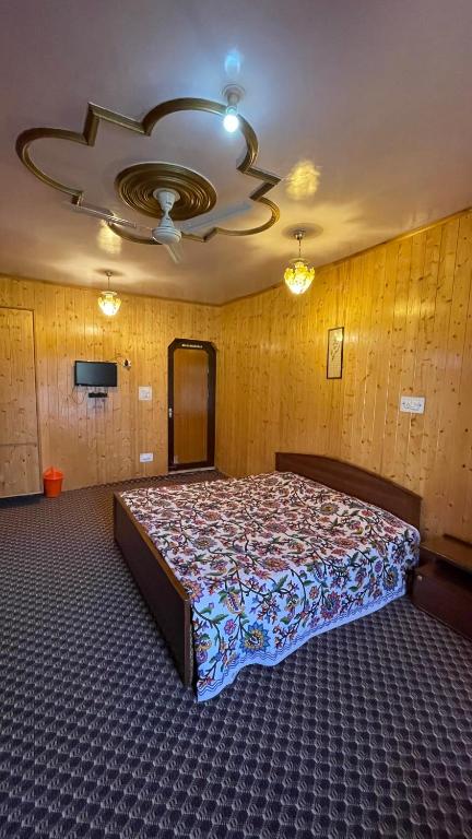 Postel nebo postele na pokoji v ubytování Dilaram Guest House