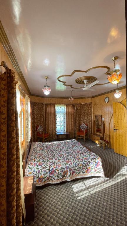 Postel nebo postele na pokoji v ubytování Dilaram Guest House