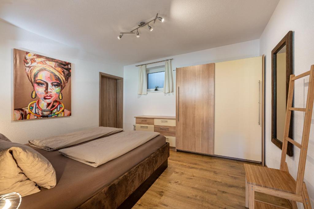 Postel nebo postele na pokoji v ubytování Ferienwohnung Alpenglück