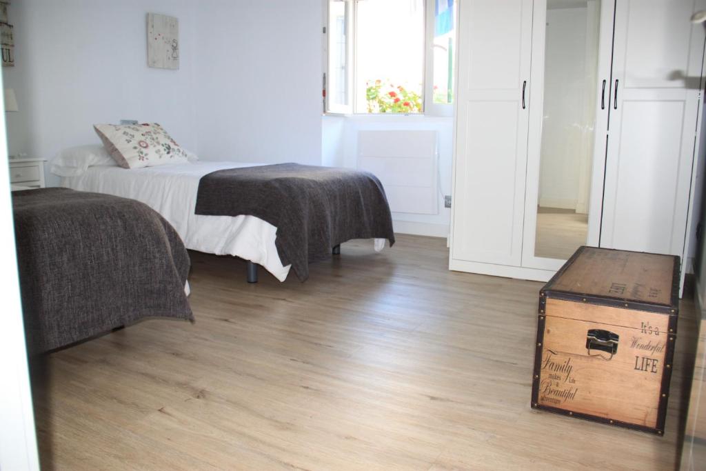 Posteľ alebo postele v izbe v ubytovaní Apartamento Rural Zuri