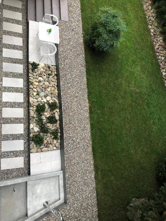 Vonkajšia záhrada v ubytovaní Palm Loggias Meran