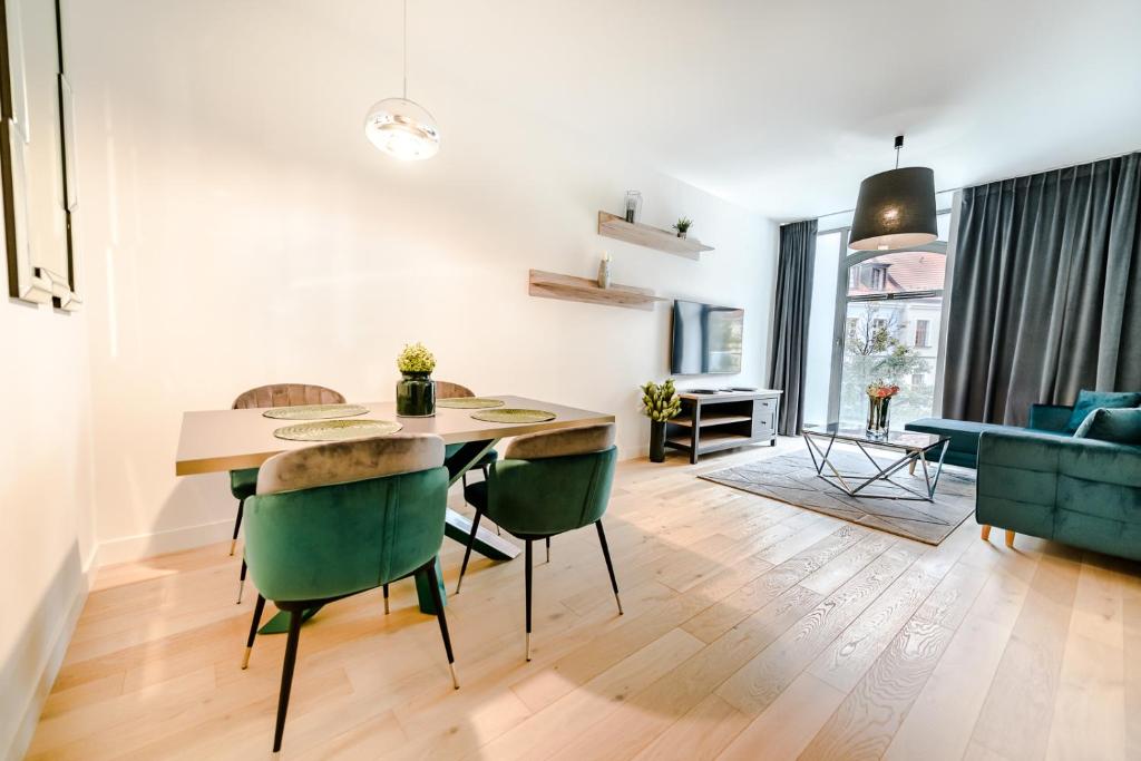 Posedenie v ubytovaní AboutArtApartments - Młyn Maria