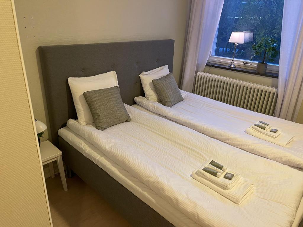 Postel nebo postele na pokoji v ubytování Hotell Luspen
