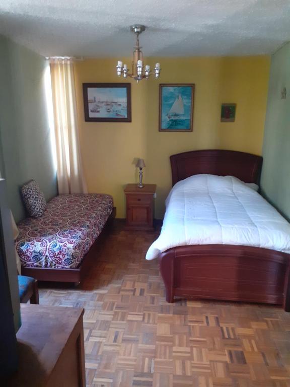 Postel nebo postele na pokoji v ubytování Casa de Tulia