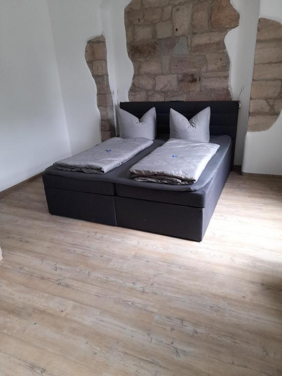 Postel nebo postele na pokoji v ubytování Gästehaus Leonie