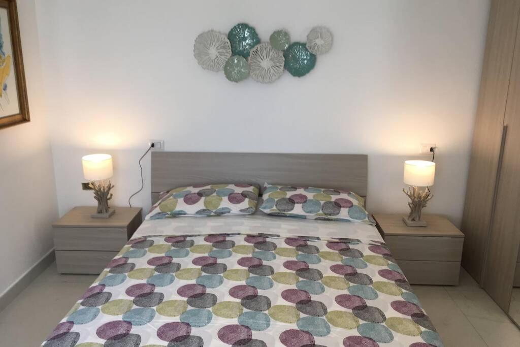 A bed or beds in a room at Casa Belvedere