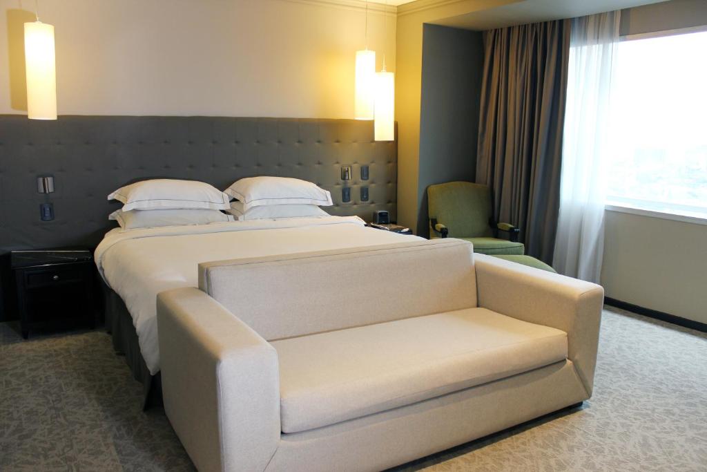 Кровать или кровати в номере Barceló Mexico Reforma
